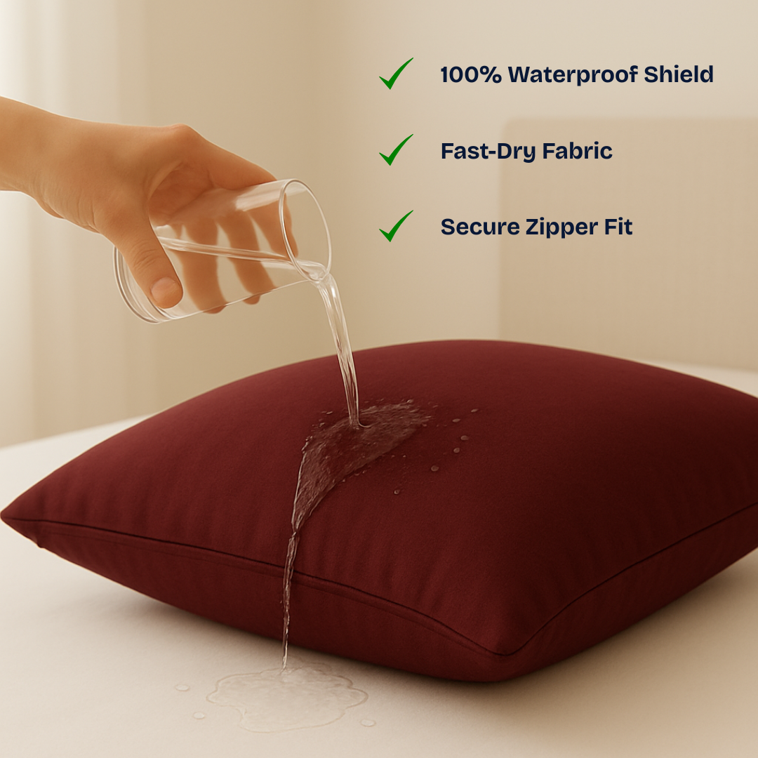A burgundy pillow on a white surface with a hand pouring water from a glass to demonstrate its waterproof feature. Text on the right lists product benefits: '100% Waterproof Shield', 'Fast-Dry Fabric', and 'Secure Zipper Fit'.