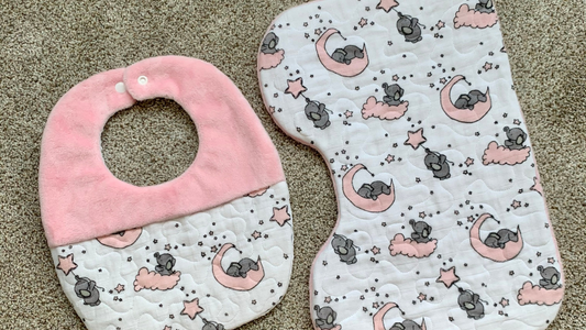 Burp Sheets vs. Bibs: Which is Better for Managing Baby Spills?