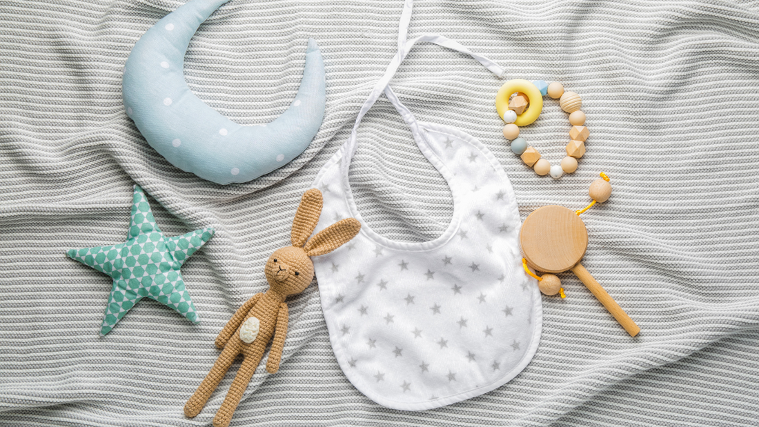 Keeping Your Baby Clean and Comfortable: The Importance of Bibs and Burp Sheets