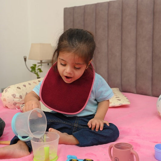 Maroon Colour Absorbent Bibs vs. Regular Bibs: What’s the Difference?