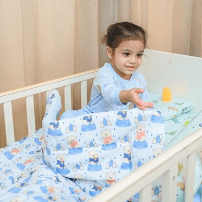 Happy Matty Baby Wrapped in Happy Matty Bear Quilt