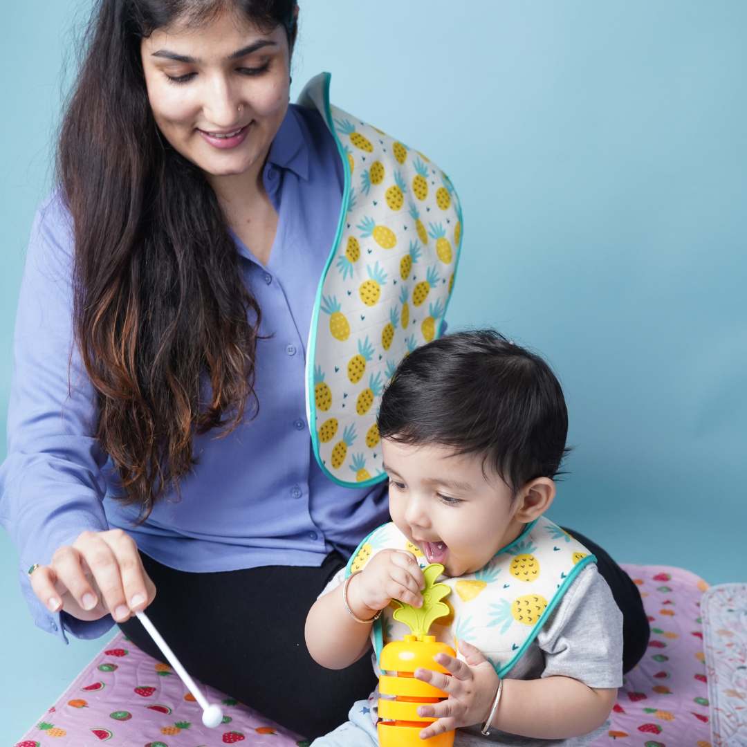 Mother-Playing-with-her-baby-on-playmat